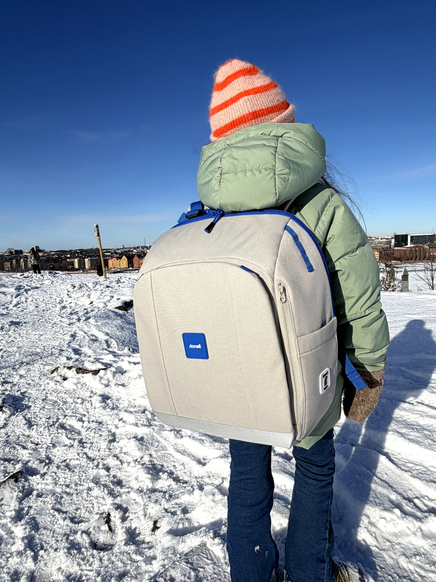 Barn b&auml;r Tryggve-ryggs&auml;ck